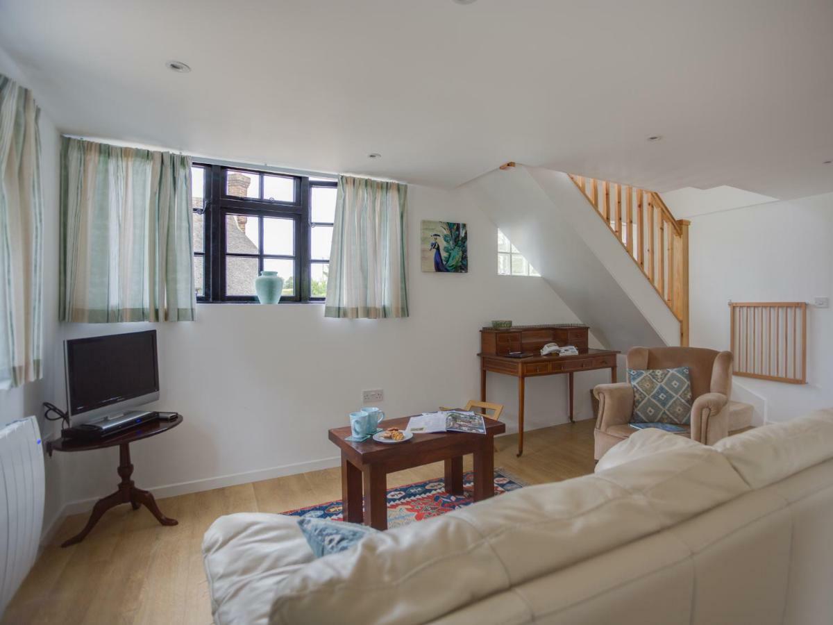 Little England Cottage Milborne Saint Andrew Bagian luar foto